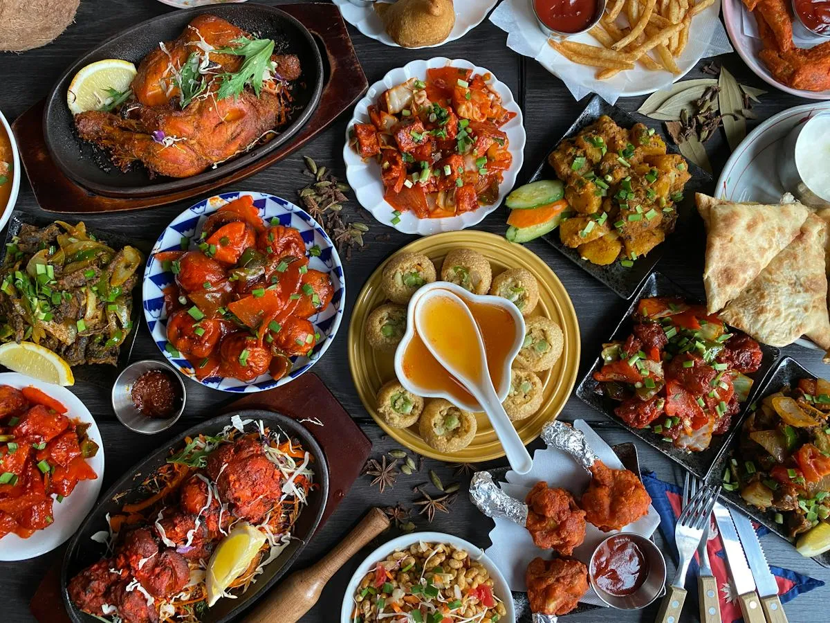 Colourful restaurant dishes shared at the table